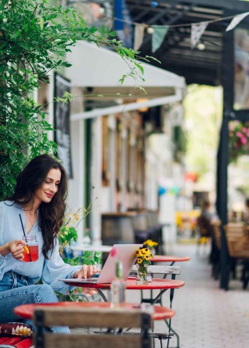 woman-sitting-in-a-street-cafe-and-drinking-cold-b-2025-04-01-13-21-36-utc-1-r7ep4wp699q5nsknswir9k7tifvmxoc5vsucyet108 (1)